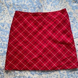 Red plaid skirt size kids 12.. fits like an adult xs/s